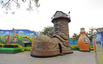 Shoe house at Toyland - Kids Fun attraction at Ramoji Film City with colorful play area.